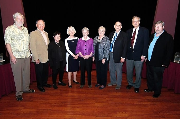 9 board members standing for picture.