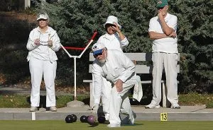 Group in white lawn bowling.