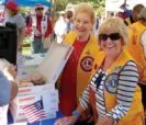 Senior citizen selling Dunkin Donuts at a stall - Rossmoor Walnut Creek